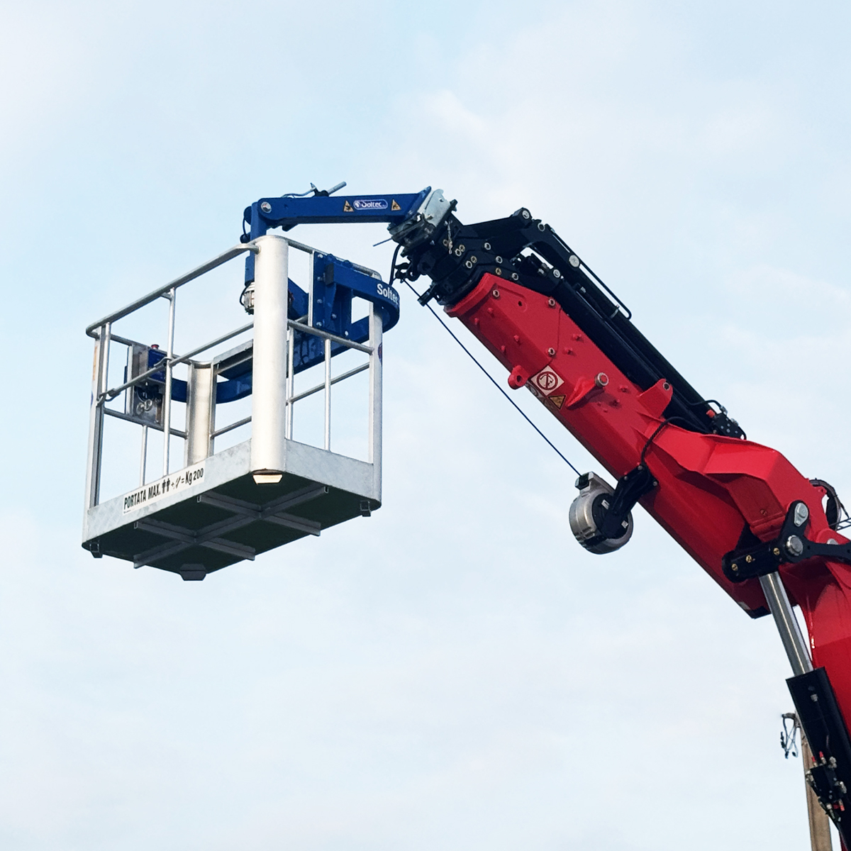 Application of a two-person personnel basket mounted on a hydraulic crane.